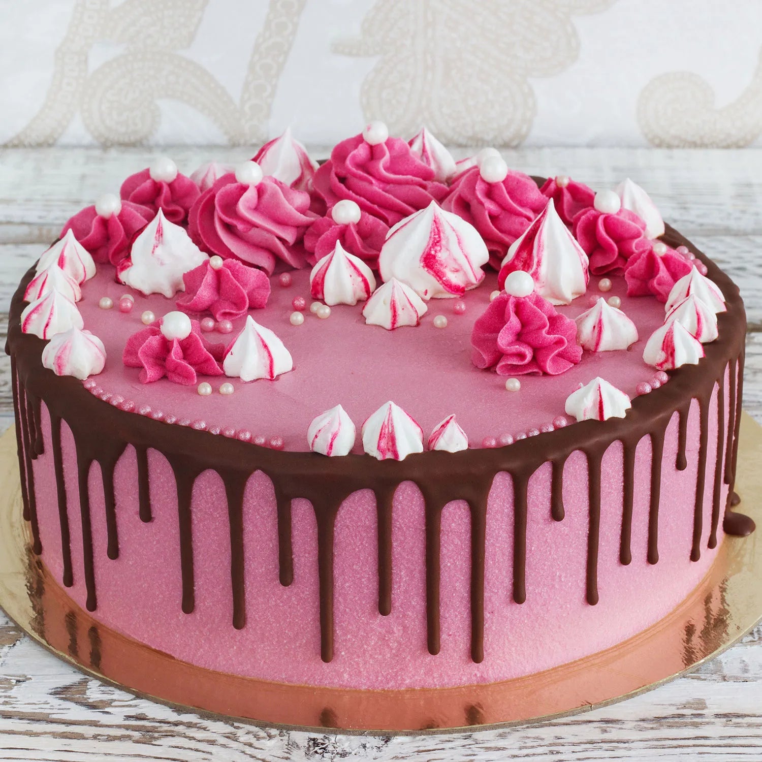 Delightful Pink Strawberry Cake Topped with Chocolate Truffle