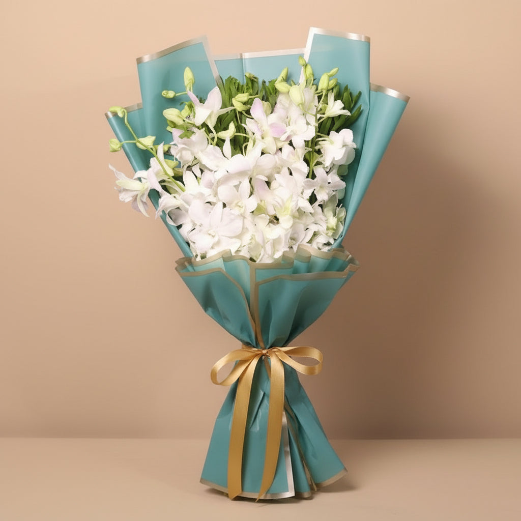 Woman holding a bouquet of white flowers wrapped in blue paper against a light blue background